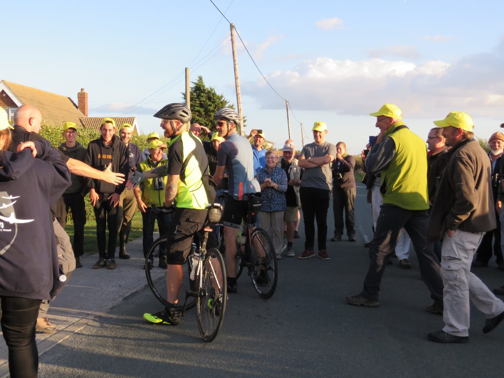 Photo: Jonny Rankin and Nick Moran arrive at the finish line in Kilnsea. Credit: Dawn Balmer.